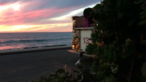 FireFighter Bus near beach Stock Footage 82187900