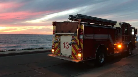 FireFighter Bus near beach Stock Footage 82187996