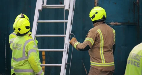 Firefighter crew – emergency service fireman rescue in action Stock Footage 345090972