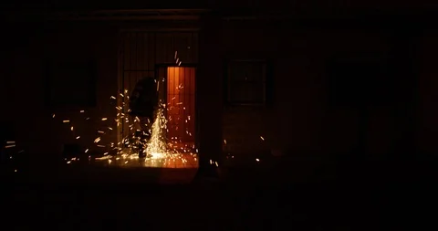 Firefighter cutting steel gate in a training course Stock Footage 107625352