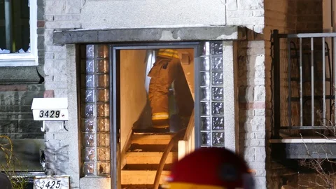 Firefighter destroying wall with hammer Stock Footage 105212839