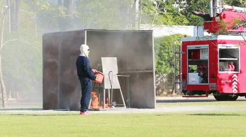 Firefighter fighting for fire attack training Stock Footage 44495372
