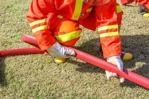 Firefighter fighting for fire attack training Stock Photos