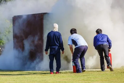 Firefighter fighting for fire attack training Stock Photos