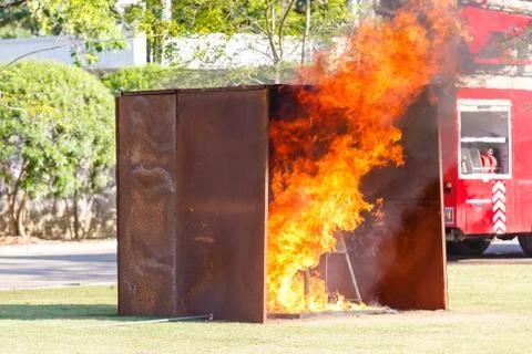 Firefighter fighting for fire attack training Stock Photos