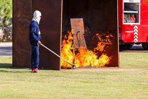 Firefighter fighting for fire attack training Stock Photos