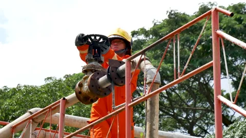 Firefighter fighting with fire flame protection property. Fireman wear hard hat, Stock-Footage 151006262