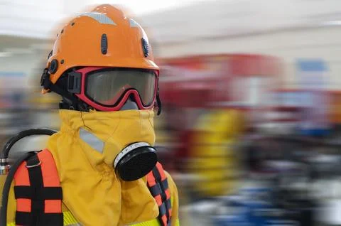 Firefighter fighting forest fire Stock Photos