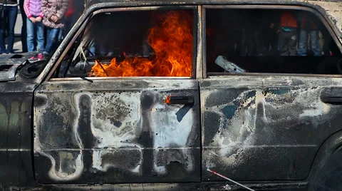 Firefighter Fire Brigade dispense foam on burning car during drill Stock Footage 62851009