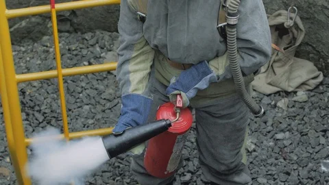 Firefighter Fire Extinguisher Stock Footage 124497639