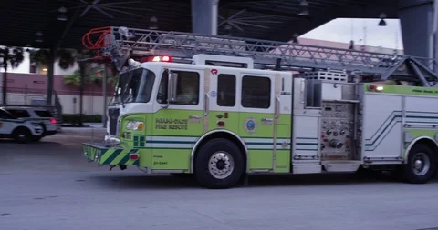 Firefighter getting out of a firetruck Stock Footage 107627616