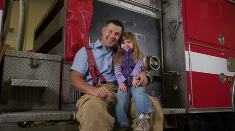 Firefighter with girl Stock-Footage 61676294