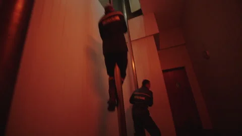 Firefighter going down the pole Stock Footage 283141378