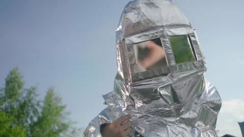A firefighter in a heat-reflective suit Stock Footage 240700505
