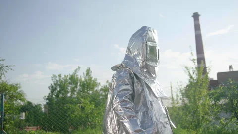 A firefighter in a heat-reflective suit Stock Footage 240700599
