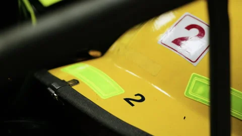 Firefighter helmet with number two in a fire station Video stock 345029988