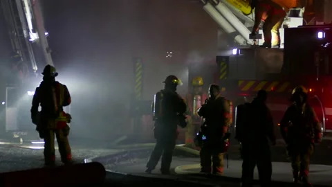 FIrefighter in the night Stock Footage 139657047