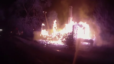Firefighter POV of  Burning Building Collapse Flames Night Stock Footage 244320820