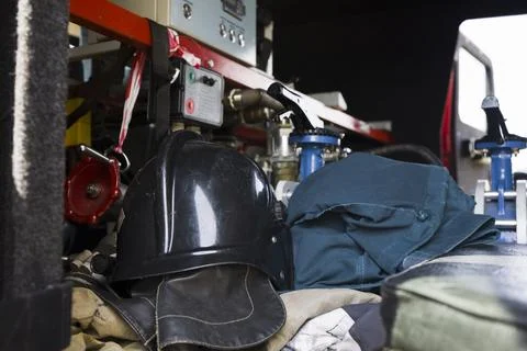 Firefighter protection clothes in the Fire engine Foto stock