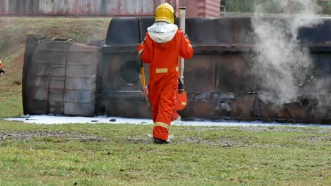 Firefighter Rescue team training in fire fighting extinguisher Video stock 276348238