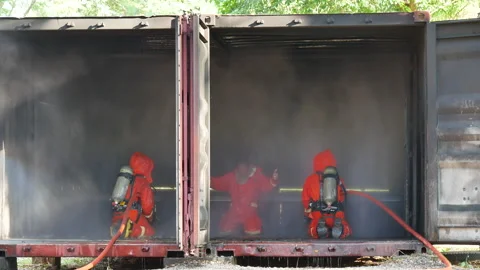 Firefighter Rescue team training in fire fighting extinguisher Stock Footage 279958282