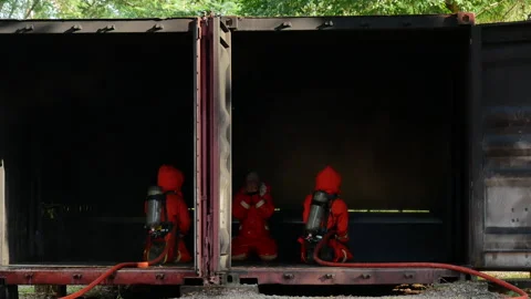 Firefighter Rescue team training in fire fighting extinguisher Stock Footage 279958349