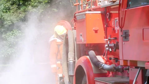 Firefighter Rescue team training in fire fighting extinguisher Stock Footage 279960079
