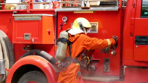 Firefighter Rescue team training in fire fighting extinguisher Stock Footage 279960439