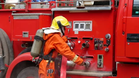 Firefighter Rescue team training in fire fighting extinguisher Stock Footage 279960490