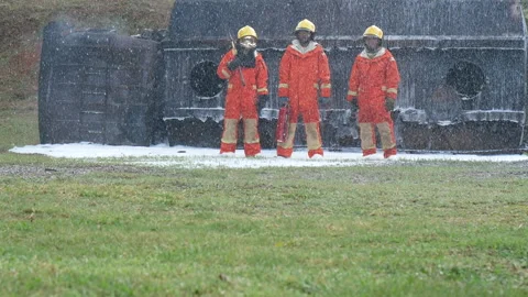 Firefighter Rescue team training in fire fighting extinguisher Stock Footage 279961033