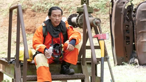 Firefighter Rescue training in fire fighting extinguisher. Stock Footage 276720413