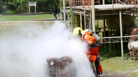 Firefighter Rescue training in fire fighting extinguisher. Stock Footage 276721028