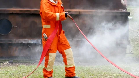 Firefighter Rescue training in fire fighting extinguisher. Stock Footage 276721211