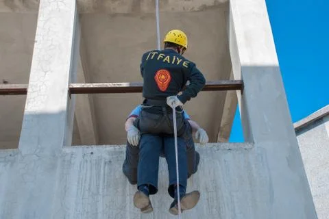 Firefighter rescue training on wire Stock Photos
