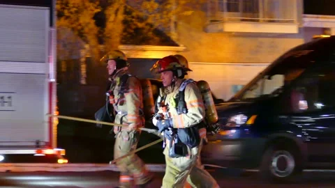 Firefighter smiling at the camera Stock Footage 139658768