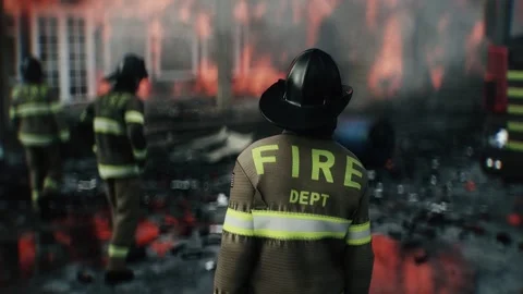 Firefighter Standing in Front of Burning House Surrounded by Flames 스톡 동영상 336516098