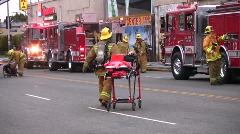 Firefighter with stretcher Stock Footage 1645794