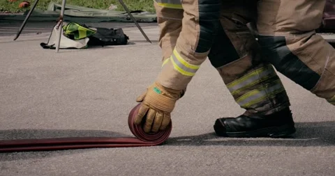 Firefighter team - fireman equipped with emergency services apparatus Stock Footage 344910519