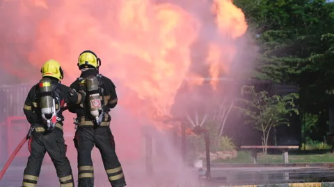 Firefighter team help and support to extinguish huge fire from gas pipe Stock-Footage 156983432
