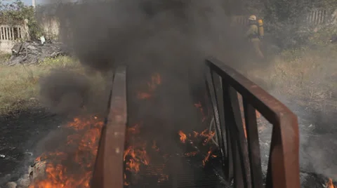 Firefighter training. Brave firemen work in the fire and smoke Video stock 36055347