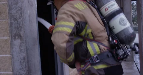 Firefighter in a training course Stock Footage 107627443