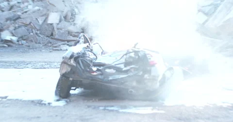 Firefighter training to extinguish a wrecked car Stock Footage 266416342