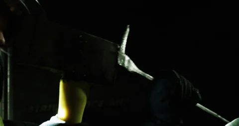 Firefighter using axe to break door Stock Footage 91145724