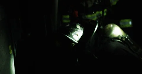 Firefighter using axe to break down door Stock Footage 91145822