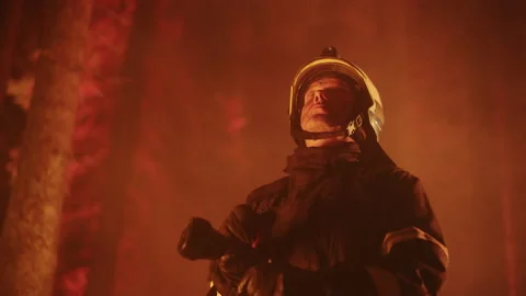 Firefighter Using Fire Hose to Battle Wildfire Stock Footage 224559303