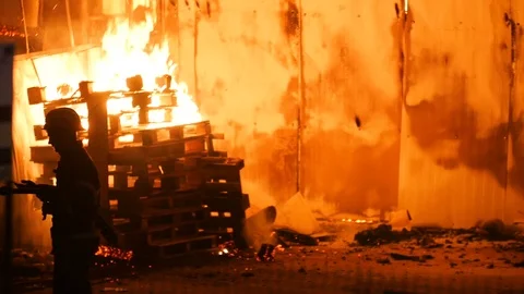 Firefighter Waiting For Orders And Texting On A Phone Stock-Footage 91329357
