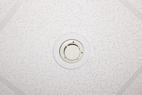 Firefighter warning on the ceiling close up Stock Photos