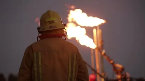 A FIREFIGHTER Watching FLAME/FIRE Effects Burn, (HD 24p) Stock Footage 272192851