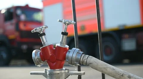 Firefighter water hose connected to hydrant Stock Footage 65190139