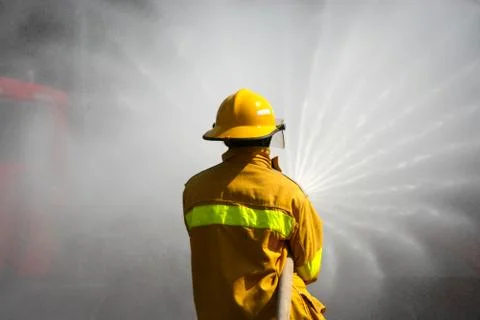 Firefighter Working Stock Photos